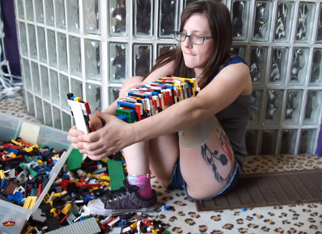 Woman fashions own prosthetic leg out of LEGO.